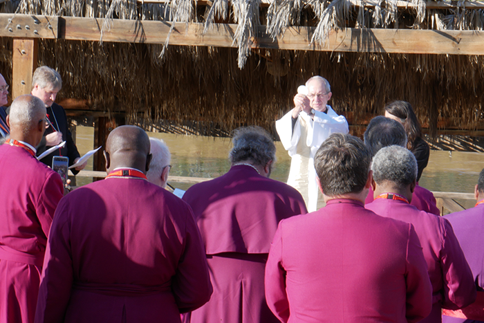 The Archbishop Of Canterbury Leads Worship At The Shores Of The River Jordan
