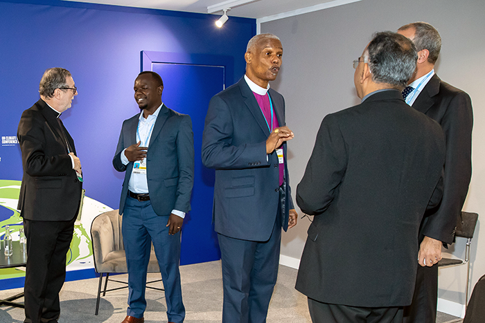 Archbishop -Julio -and -Nicholas -Pande -engaging -at -COP26_Anglican -Alliance _700x 467