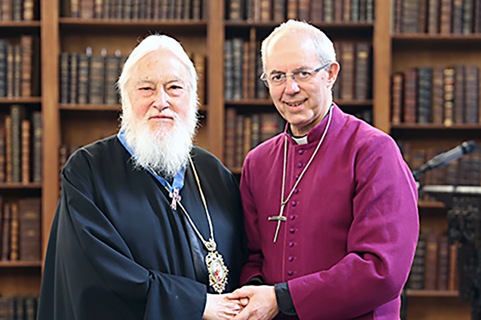 The Archbishop of Canterbury, Justin Welby, presents Metropolitan Kallistos with the Lambeth Cross for Ecumenism for his 
