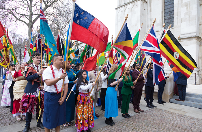 Young people from the Commonwealth prepare to process into Westminster Abbey with their Nation’s flags